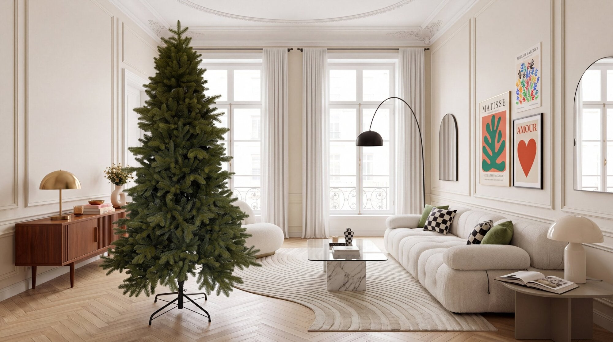 A Casapino tree in a bright living room with tall windows, a cream sofa and a wooden sideboard